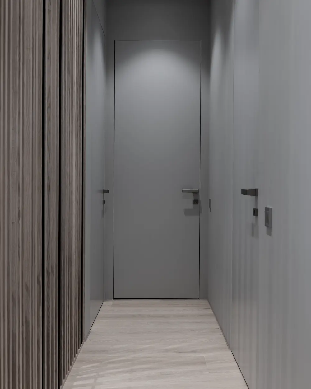 Corridor of grey apartment doors